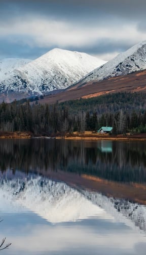 Seward harbor with snow-capped mountains rising from the sea